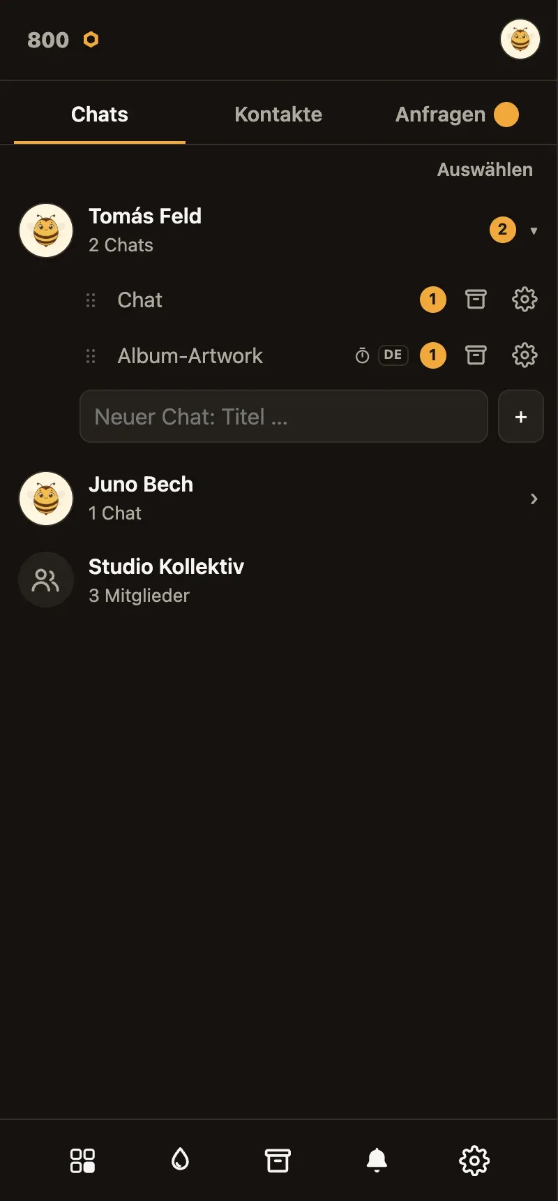 Chat list: the contact Tomás Feld is expanded, showing two chats — “Chat” and “Album-Artwork”, the latter with a timer icon and a DE badge.