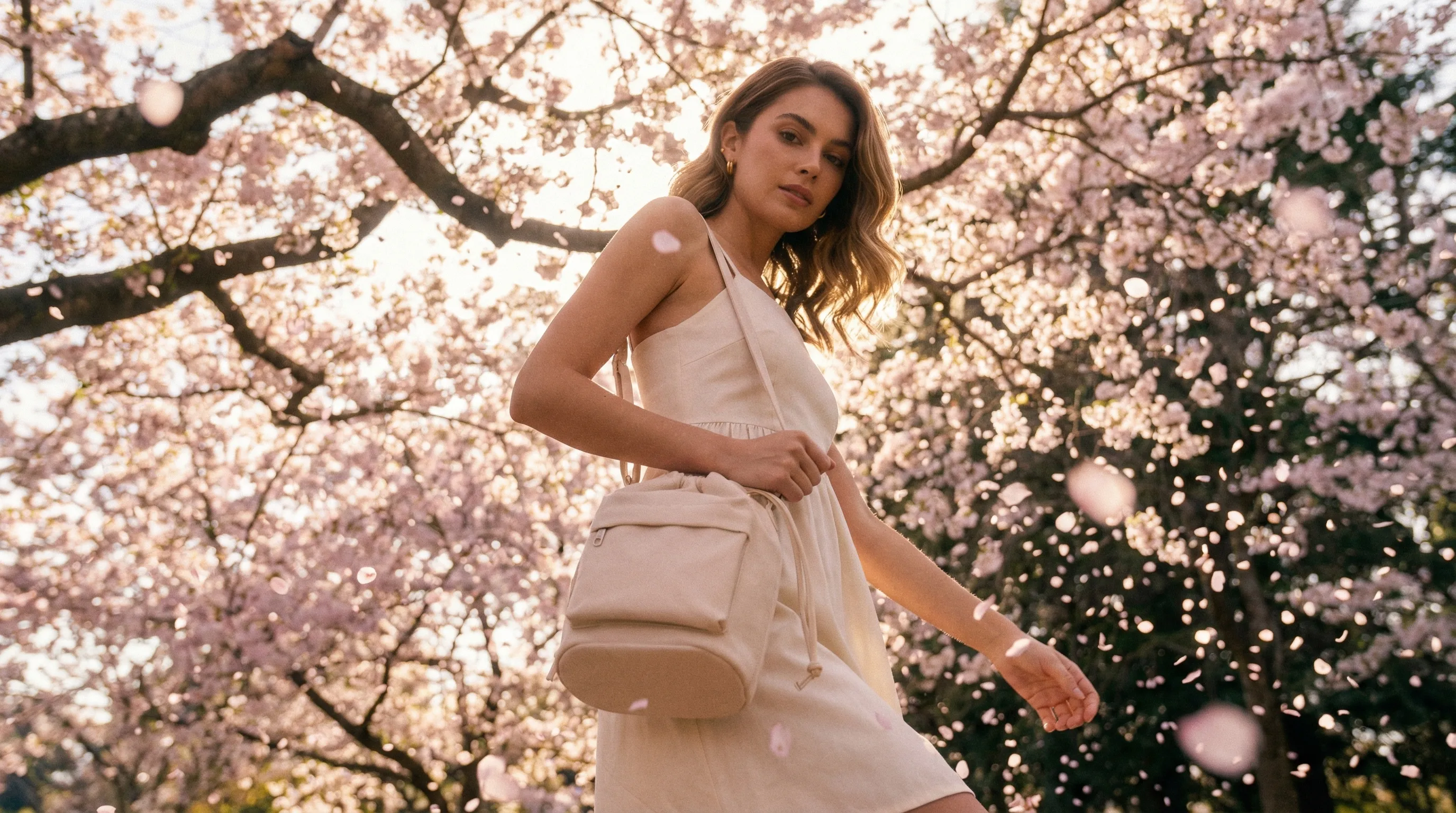 Chalisa spring collection banner with model and handbag
