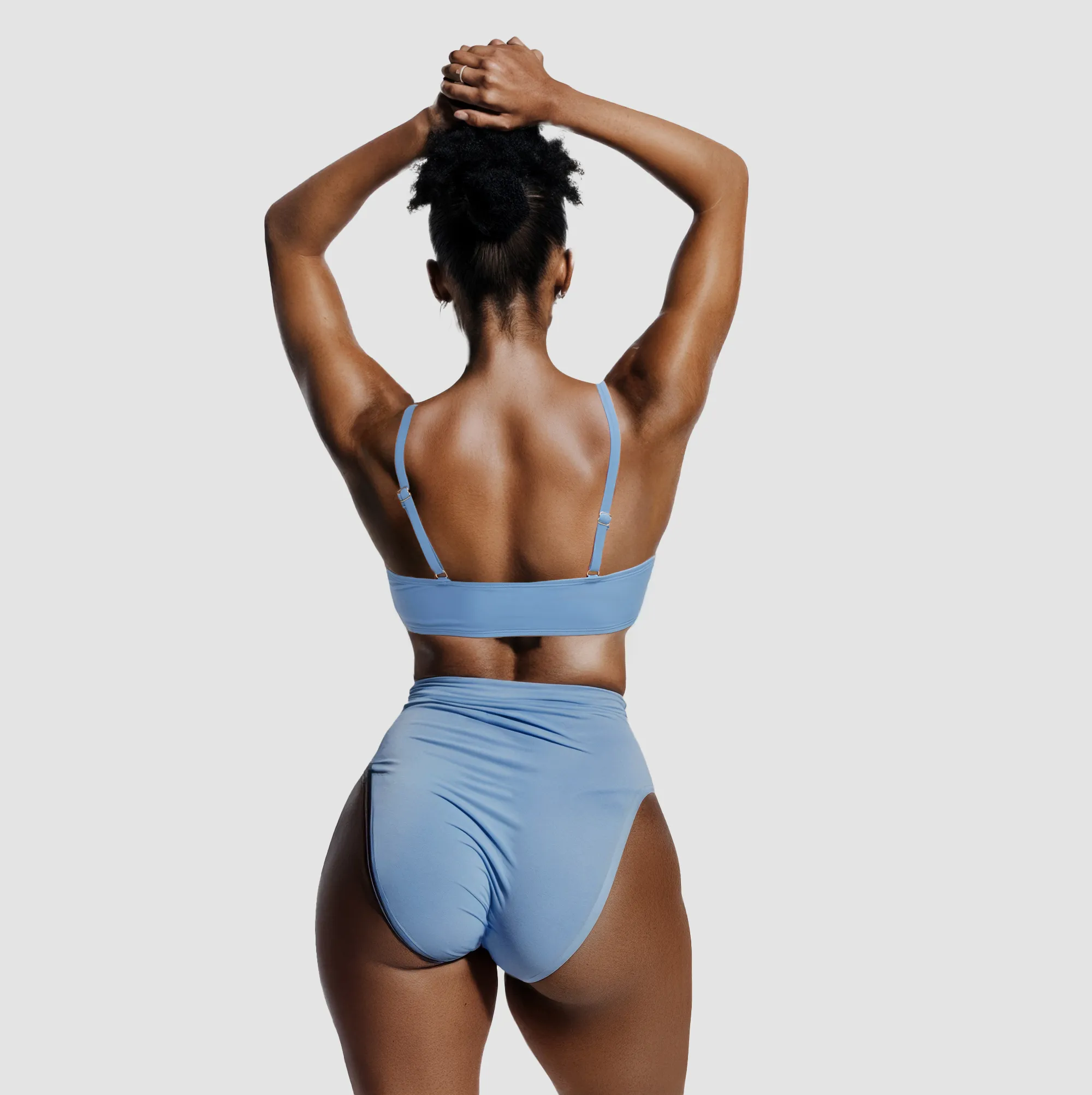 Blue high-waisted Creamy Fabrics bikini from behind