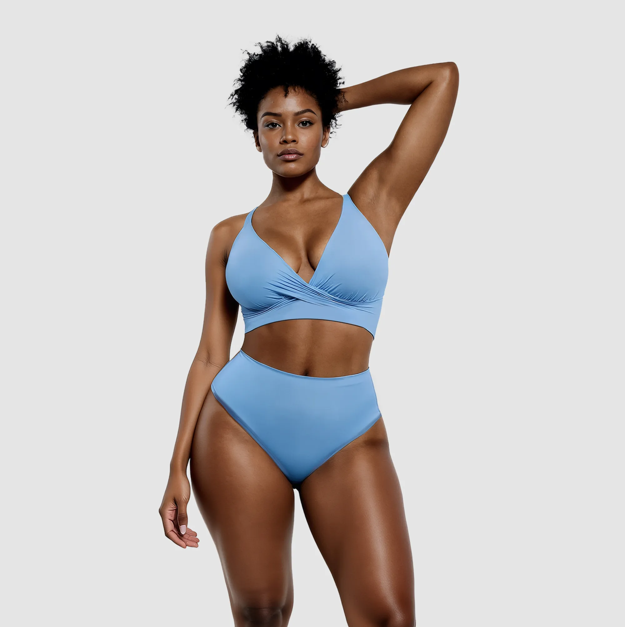 Blue bikini with twist top and high-waisted bottoms, front view