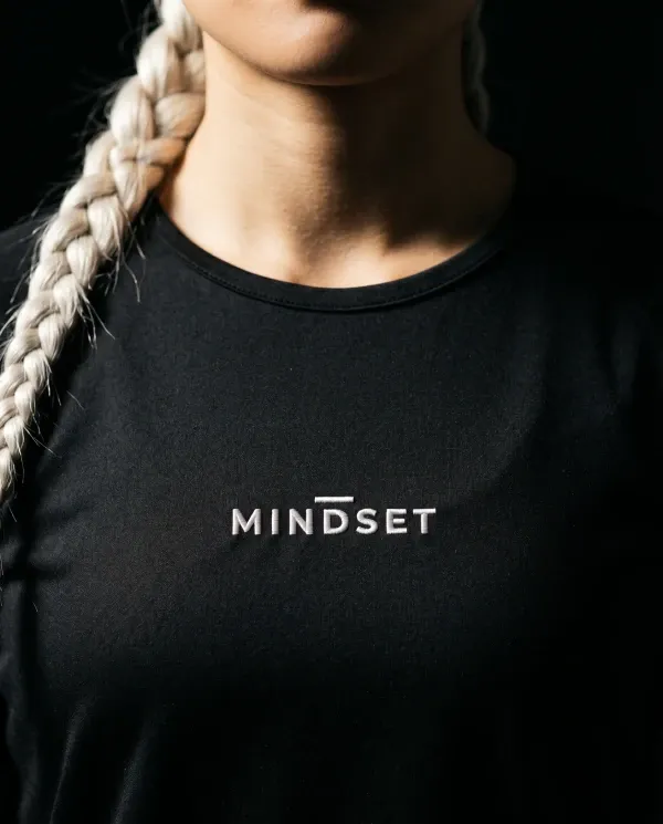 AI detail shot of Mindset Studio jersey embroidery on the model
